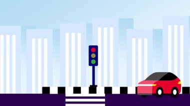 Trafik ışıklarında bekleyen kalabalık bir şehir kavşağı, şehir ulaşımını, yol sistemlerini ve günlük gidip gelen hayatı vurguluyor.