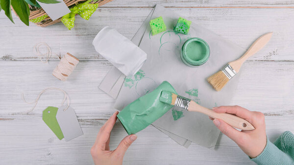 Sustainable hobby background with handmade urban ecology gardening. Creative upcycling DIY idea, craft upcycled tin can pots for growing house plants and edible herbs, home decoration. Flat lay