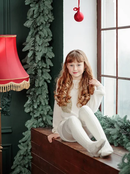 Happy Young Girl Sitting Window Christmas Tree Cozy Living Room 스톡 사진