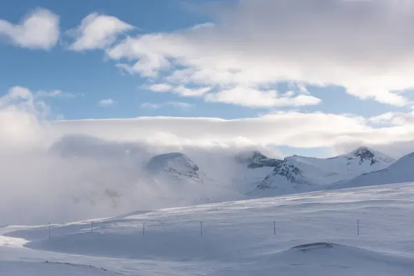 stock image Low clouds rolling through the Swedish mountains near Sylarna on a ski tour