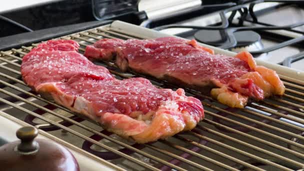 Preparing Ribeye Raw Steaks Eletric Grill Sunday Lunch Kitchen — Stock Video