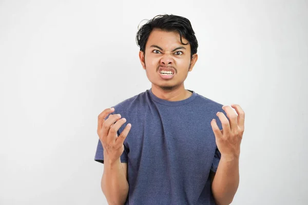 stock image Portrait of angry pensive crazy Asian young man screaming. Closeup Young Asian man panicking isolated on white background. Stress burnout office syndrome overload work hard office male