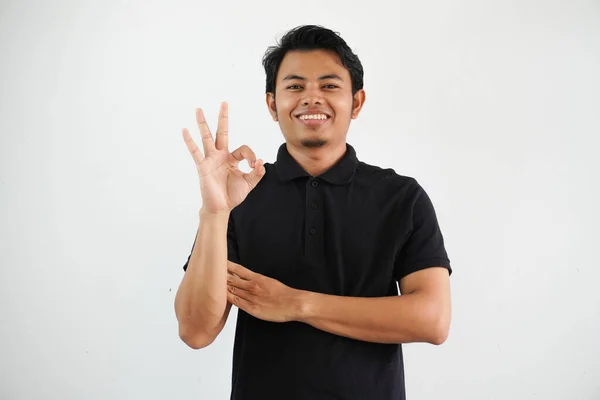 Mladý Asijský Muž Usměvavý Přátelský Při Poskytování Prst Znamení Sobě — Stock fotografie