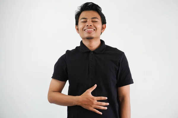 Jonge Aziatische Man Poseren Een Witte Achtergrond Het Dragen Van — Stockfoto