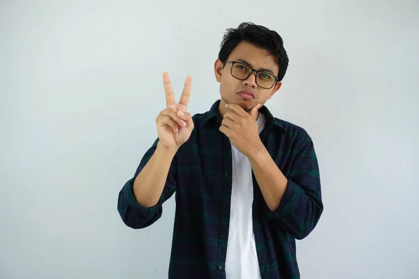 Giovane Asiatico Uomo Mostrando Curioso Faccia Espressione Mentre Dare Due — Foto Stock