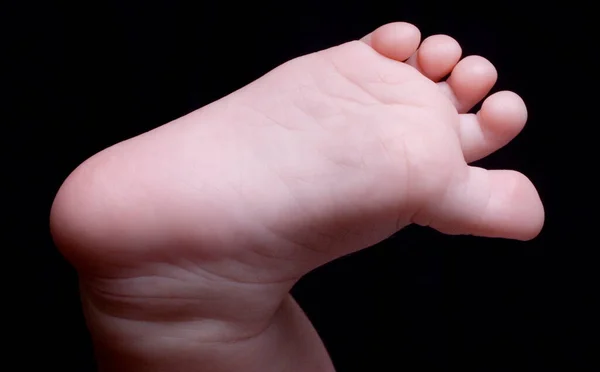 Baby Foot Black Background — Stock Photo, Image
