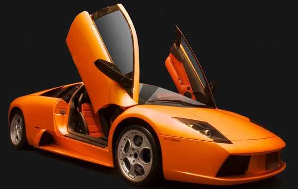 Egy Narancssárga Olasz Sportautó Fekete Háttér — Stock Fotó