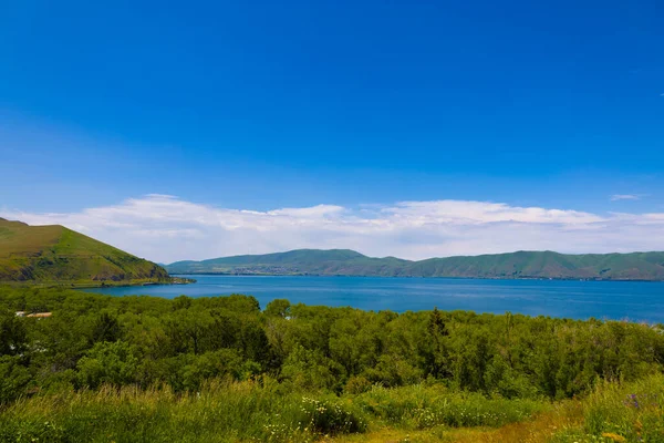 stock image Lake Sevan and surrounding mountains on a clear summer day