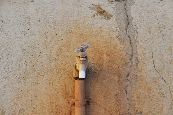 A closeup Picture of Plastic Tap for House water connection In Rural India