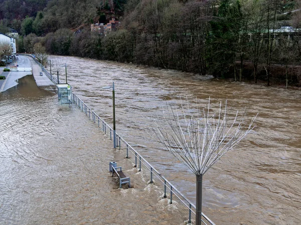 Flood river Lenne in Altena, Germany, street is flooded. First flood in 2023.
