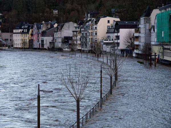 Flood river Lenne in Altena, Germany, street is flooded. First flood in 2023.