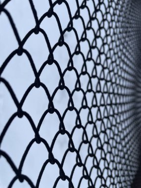 black grid fence on the street