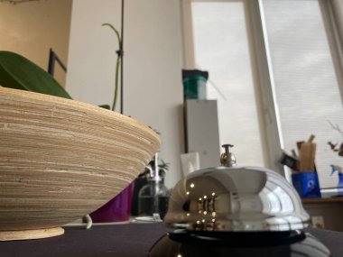 reception table in restaurant interior. close up of bell, hotel, service, call