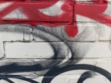 Şehir merkezindeki boyalı bir duvarın duvar yazısı. bir duvarın arka planı. Şehir sanatı. kültür kültürü