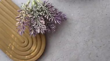 lavender flower in a wooden spoon