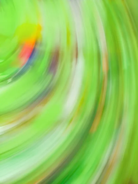 抽象グリーンライトトレイル渦 円形の緑のパターンで動く光 — ストック写真