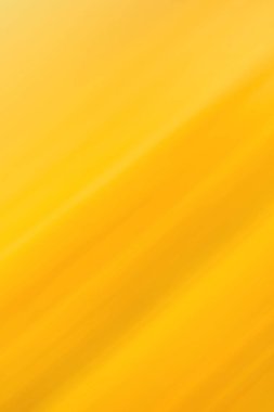 Turuncu ve sarı renkli, parlak, sıcak bir parıltı. Soyut yaz arkaplanı için turuncu sarı bokeh ve güneş ışığı