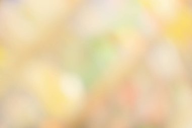 Blurred motion gold pink champagne glittering lights background. Glittering pink bokeh backdro
