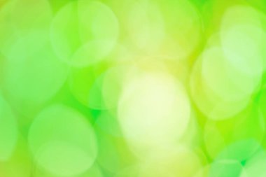 Yeşil sis bokeh arkaplanı. Yeşil zeytin rengi odak arkaplanından bulanık hareket.