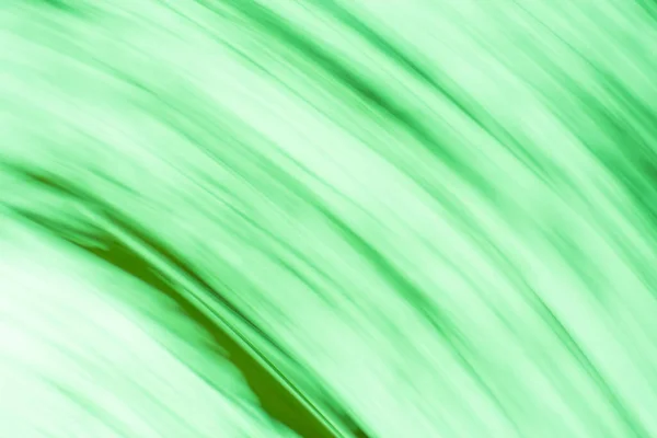 추상적 녹색의 소용돌이는 초점을 이루지 파동을 일으킨다 — 스톡 사진