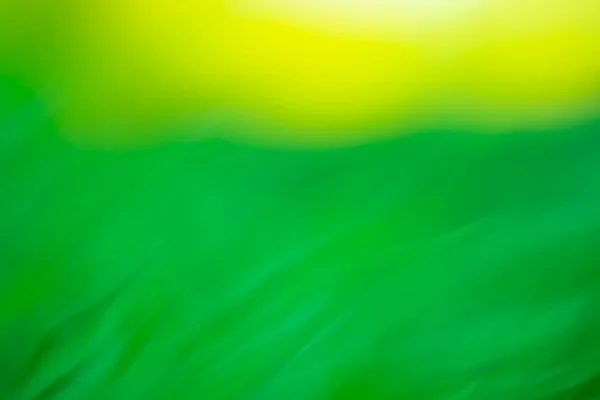 stock image Motion blurred defocused abstract green background. Green  abstract defocused motion blurred background. 