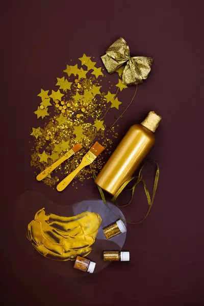 Gold party decoration. Warm holiday golden glow background. Decor means and tools of gold color.