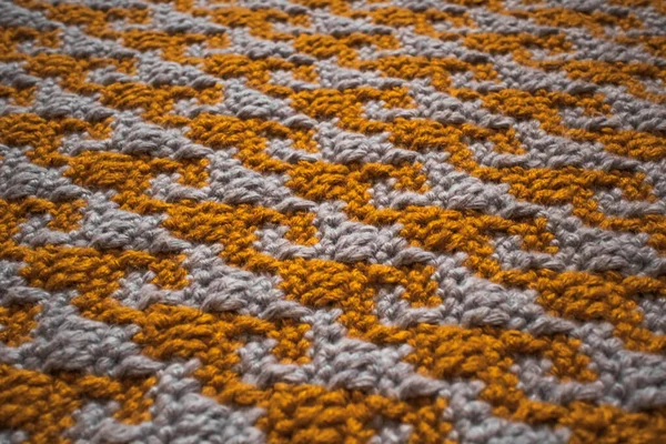 Bright tight crochet pattern. Domino pattern in the style of mosaic crochet.