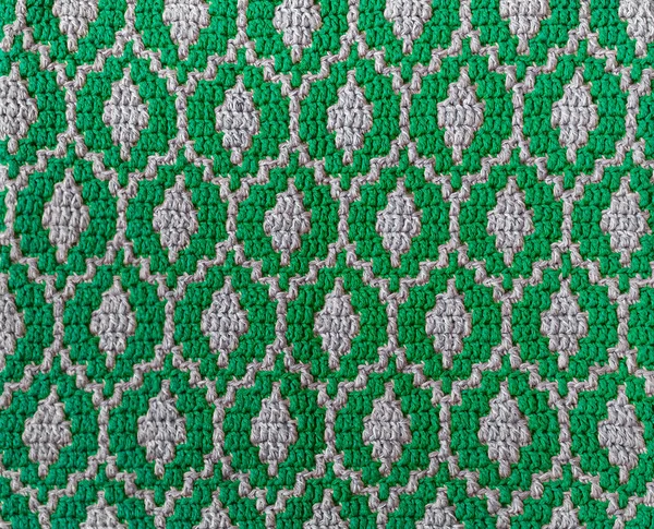 ミントグレーモザイクかぎ針編みのテクスチャ 楕円形の繰り返しパターン 編まれた背景 — ストック写真