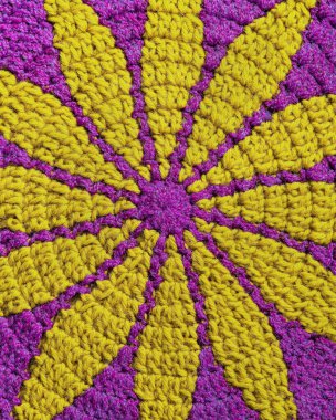 Parlak mor Marguerite örgü deseni. Örgü dokusunu kapat. Üst görünüm.