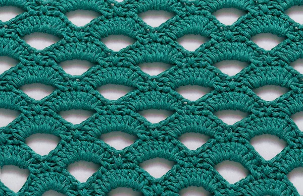 穴のあるターコイズシームレスなかぎ針編みのテクスチャ かぎ針編みのアーケードステッチ — ストック写真