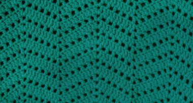 Sembol dikişli turkuaz örgü dokusu. Zigzag desenli örgü kumaşı..