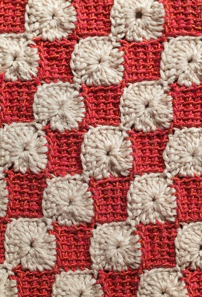 赤白のかぎ針編みチュニジアパターン シームレスニットの質感 ロイヤリティフリーのストック写真