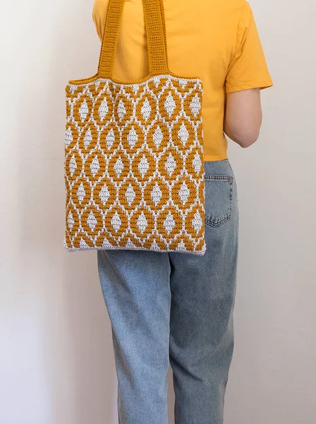 Woman Blue Jeans Yellow Shirt Handmade Crochet Orange Bag White — Stock Photo, Image