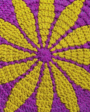 Parlak mor Marguerite örgü deseni. Örgü dokusunu kapat. Üst görünüm.