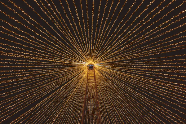Low angle view of Christmas lights decoration in Porto, Portugal by night