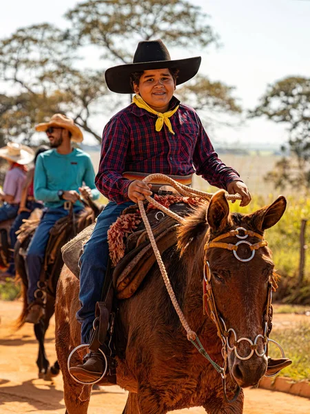 stock image Apore, Goias, Brazil - 05 07 2023: Horseback riding event open to the public on public roads in the Brazilian city of Apore