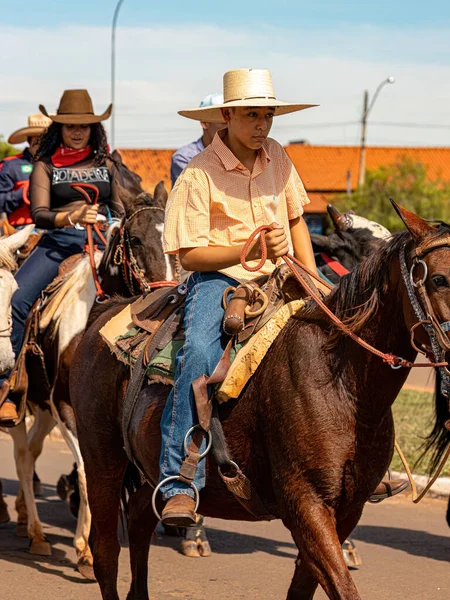 stock image Apore, Goias, Brazil - 05 07 2023: Horseback riding event open to the public on public roads in the Brazilian city of Apore