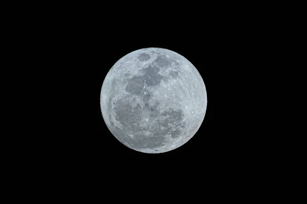 stock image closeup to represent blue moon expression used to designate the second full moon of the month