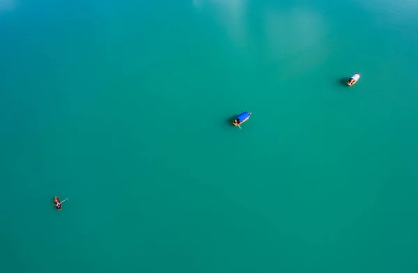 aerial view of boats floating over the lake, drone photo