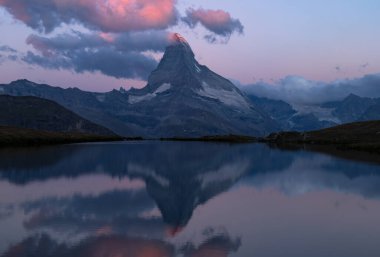 Matterhorn peak as seen from Lake Stellisee before sunset, Zermatt, Switzerland