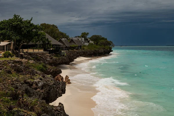 beautiful tropical beach with palm trees and blue sky, Nungwi , Zanzibar