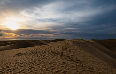 Maspalomas Dunes photographed at sunrise golden hour. Gran Canaria, Spain