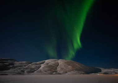Aurora borealis on Norwegian fjords, Tromso, Norway