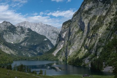 beautiful landscape of the lake in the mountains, Obersee lake, German Alps, reflections in water