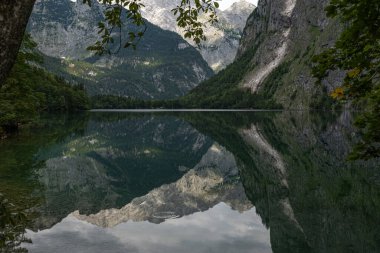 beautiful landscape of the lake in the mountains, Obersee lake, German Alps, reflections in water