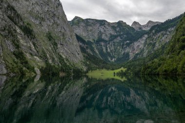 beautiful landscape of the lake in the mountains, Obersee lake, German Alps, reflections in water