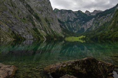 beautiful landscape of the lake in the mountains, Obersee lake, German Alps, reflections in water