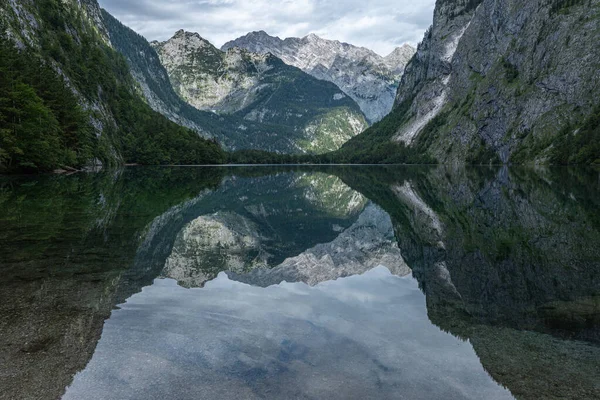 beautiful landscape of the lake in the mountains, Obersee lake, German Alps, reflections in water