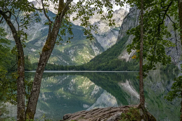 beautiful landscape of the lake in the mountains, Obersee lake, German Alps, reflections in water