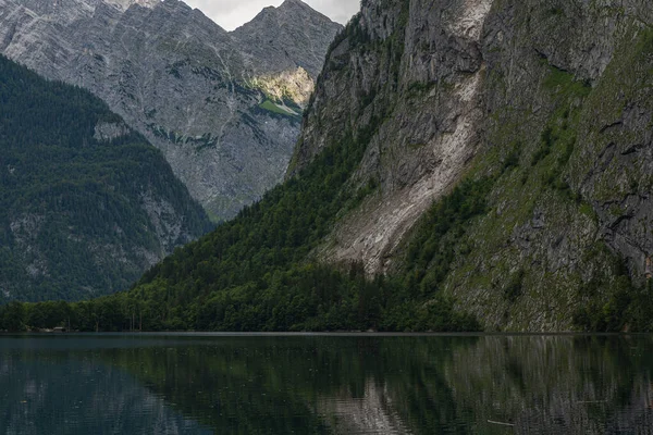 beautiful landscape of the lake in the mountains, Obersee lake, German Alps, reflections in water